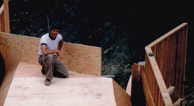 Dan building a home foundation form in the 1970's.